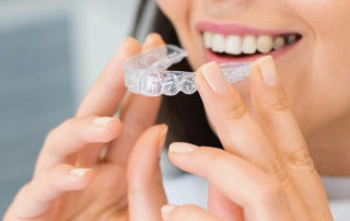 Invisalign is a type of orthodontic treatment to help straiten teeth.